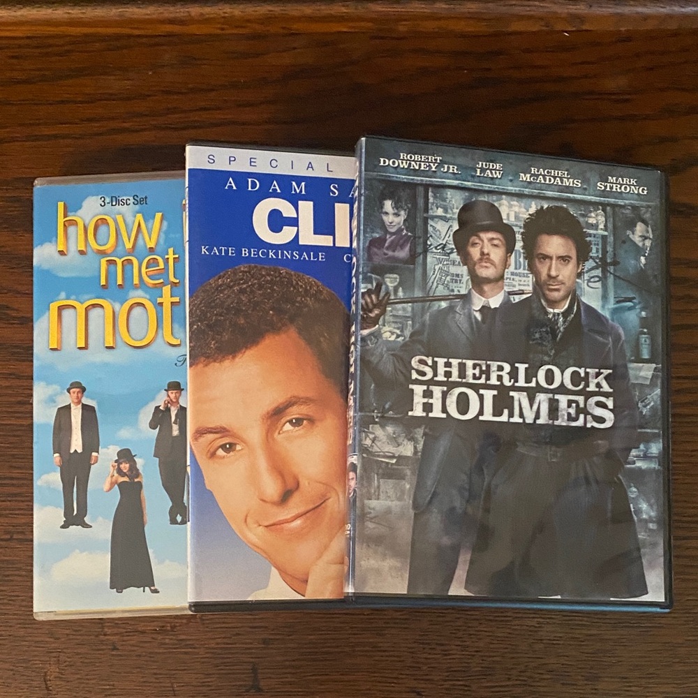 Damaged DVD box Set: How I Met Your Mother, Click, Sherlock Holmes